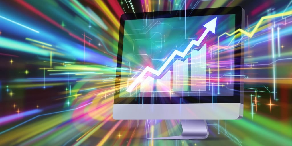 Computer screen showing upward growth trend with digital light streaks.